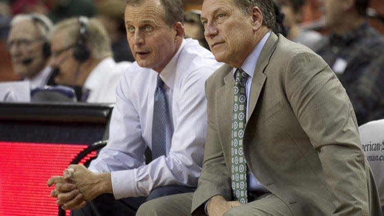 Rick Barnes and Tom Izzo visit before their game on Dec. 21, 2013 at Texas, where Barnes was the coach. Barnes now coaches Tennessee, which is playing an exhibition at MSU on Sunday to benefit the Maui wildfire relief effort.