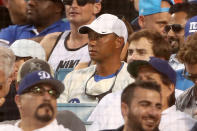 <p>Tiger Woods attends game two of the 2017 World Series between the Houston Astros and the Los Angeles Dodgers at Dodger Stadium on October 25, 2017 in Los Angeles, California. (Photo by Christian Petersen/Getty Images) </p>