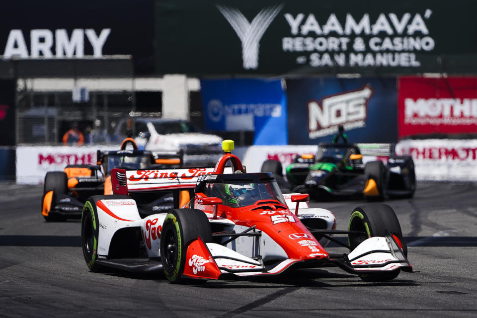 FILE - Dale Coyne Racing driver Nolan Siegel, front, leads Arrow McLaren SP driver Pato O'Ward and Juncos Hollinger Racing driver Agustin Canapino during the IndyCar Grand Prix of Long Beach auto race Sunday, April 21, 2024, in Long Beach, Calif. Arrow McLaren made yet another driver change Tuesday, June 18, when it signed 19-year-old Nolan Siegel to drive the remainder of the IndyCar season. He will be the third different driver to race the No. 6 this year. (AP Photo/Ryan Sun, File)