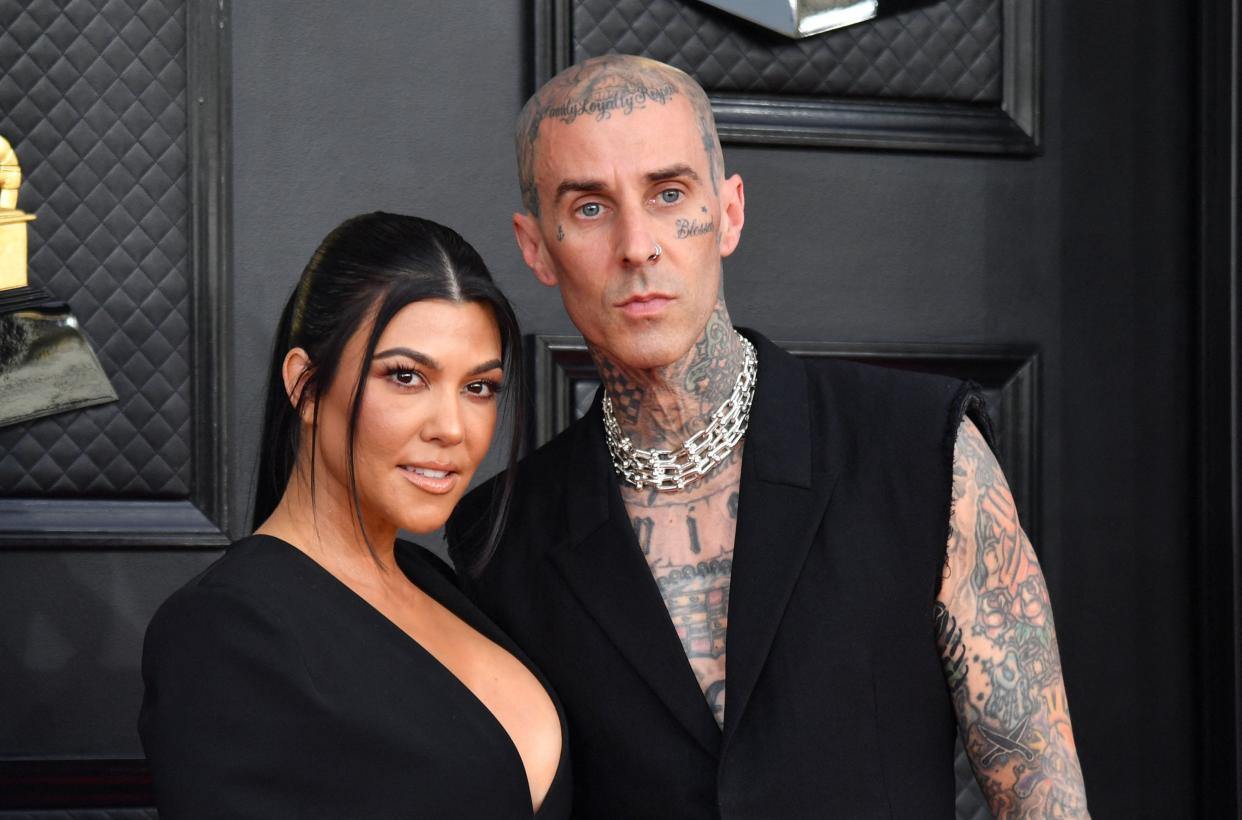 Kourtney Kardashian and musician Travis Barker arrive for the 64th Annual Grammy Awards at the MGM Grand Garden Arena in Las Vegas on April 3, 2022.