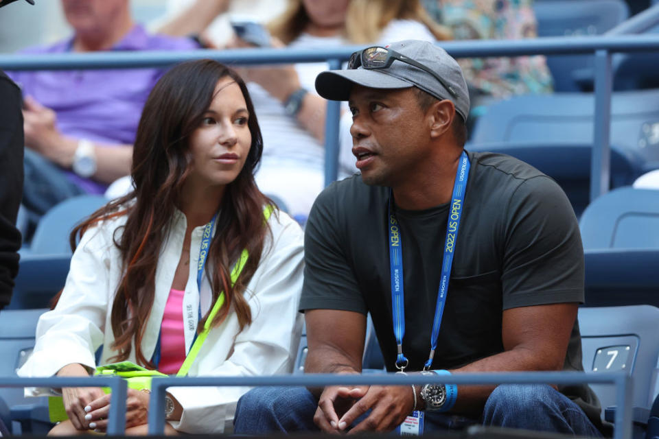 NEW YORK, NEW YORK - AUGUST 31: Erica Herman and Tiger Woods look on prior to the Women's Singles Second Round match  between Anett Kontaveit of Estonia and Serena Williams of the United States on Day Three of the 2022 US Open at USTA Billie Jean King National Tennis Center on August 31, 2022 in the Flushing neighborhood of the Queens borough of New York City. (Photo by Matthew Stockman/Getty Images)