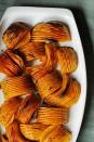 <p>An unusual spin on the classic butternut squash, this recipe uses plenty of butter, sage, and garlic to make a side dish so good you won't be able to have just one serving.<br></p><p><em><a href="https://www.womansday.com/food-recipes/food-drinks/recipes/a60499/hasselback-butternut-squash-with-browned-butter-recipe/" rel="nofollow noopener" target="_blank" data-ylk="slk:Get the Hasselback Butternut Squash with Browned Butter recipe.;elm:context_link;itc:0;sec:content-canvas" class="link "><strong>Get the Hasselback Butternut Squash with Browned Butter recipe.</strong></a></em></p>