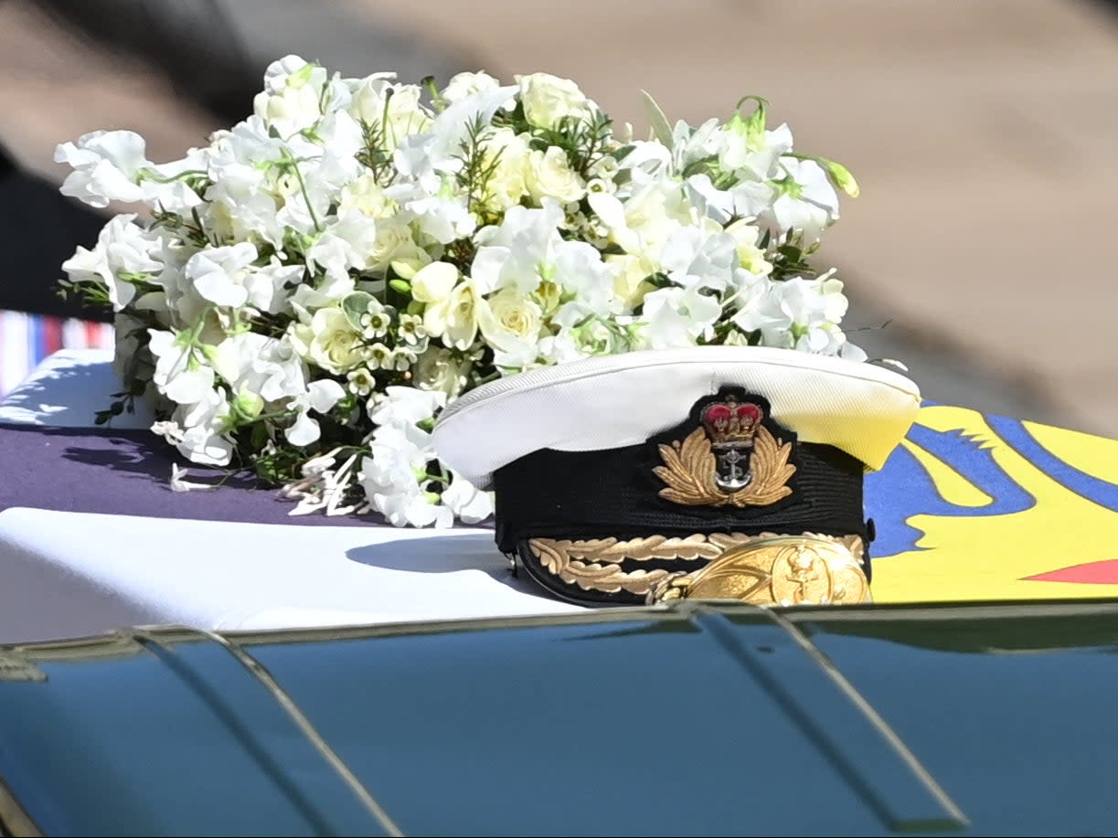 <p>The Queen’s wreath featured white flowers chosen by the monarch including freesia, lilies, sweet peas and roses</p> (POOL/AFP via Getty Images)
