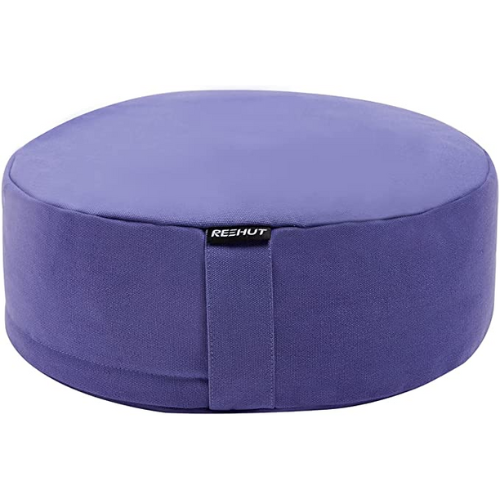 purple circular meditation cushion against white background