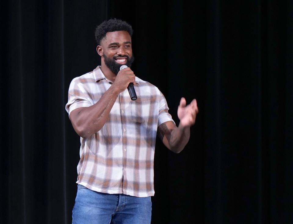 Raheem Mostert smiles during the Waves of Success Summit at New Smyrna High School, Friday, May 19, 2023.