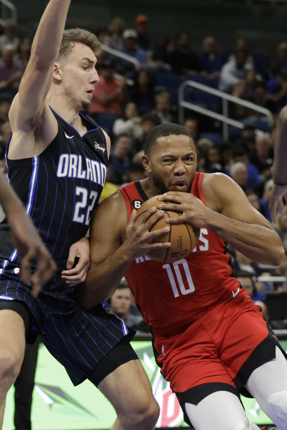 Houston Rockets guard Eric Gordon (10) drives against Orlando Magic forward Franz Wagner (22) during the first half of an NBA basketball game, Monday, Nov. 7, 2022, in Orlando, Fla. (AP Photo/Kevin Kolczynski)