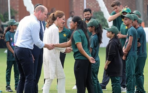 William and Kate meet young players at the National Cricket Academy in Pakistan - Credit: Getty