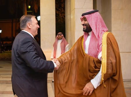 U.S. Secretary of State Mike Pompeo shakes hands with Saudi Arabia's Crown Prince Mohammed bin Salman in Jeddah
