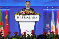 Nong Rong, Assistant Minister of Foreign Affairs of China, speaks at the 10th Beijing Xiangshan Forum in Beijing, Tuesday, Oct. 31, 2023. Singapore's defense minister Ng Eng Hen called on China, as a dominant power in Asia, to take the lead in reducing tensions by being a benevolent one, warning that military conflict like the wars in Ukraine and Gaza would be devastating to the region's future. (AP Photo/Ng Han Guan)