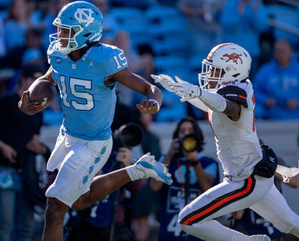 North Carolina quarterback Conner Harrell (15) scores on a 61-yard run in the fourth quarter to give the Tar Heels’ a 52-7 lead against Campbell on Saturday, November 4. 2023 at Kenan Stadium in Chapel Hill, N.C.