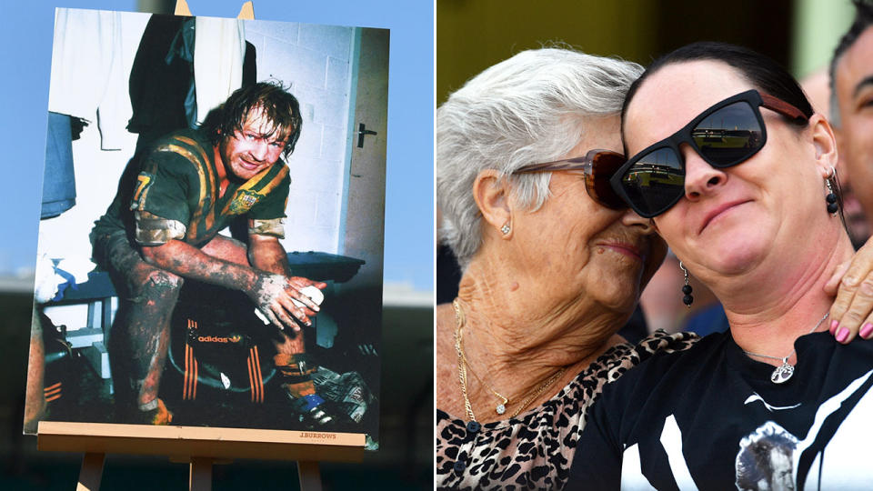 A Tommy Raudonikis' picture is positioned proudly as wife Trish watches the memorial service from the crowd.