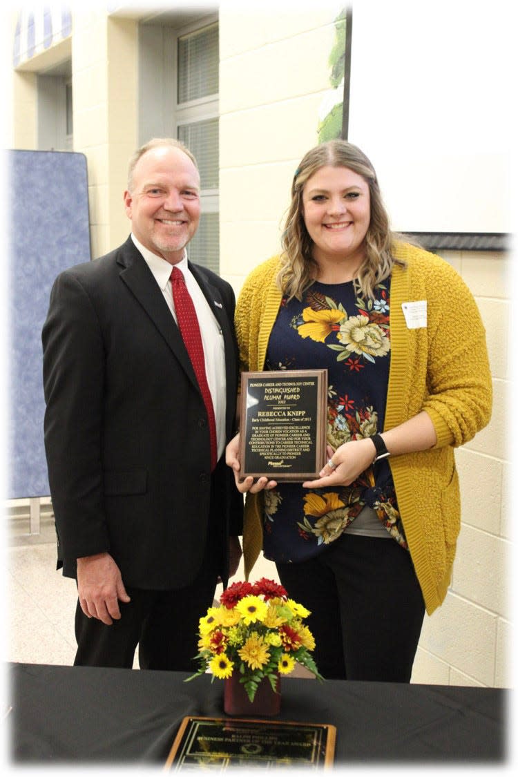 Distinguished Alumni Honoree Rebecca Knipp with Pioneer Superintendent Greg Nickoli.