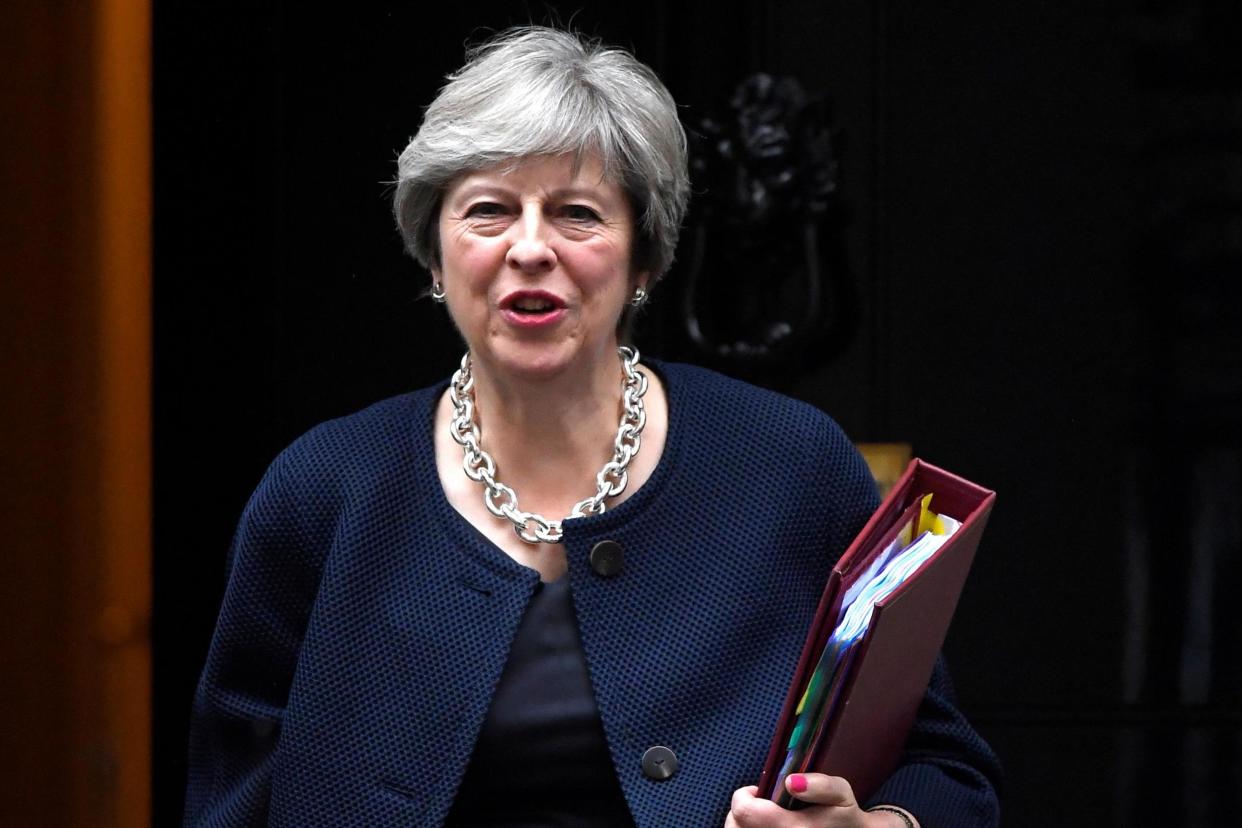 U-turn: Theresa May's Government has said the Universal Credit helpline will now be free: REUTERS