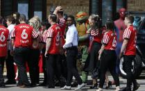 <p>Jermain Defoe (centre) during the funeral of Bradley Lowery </p>