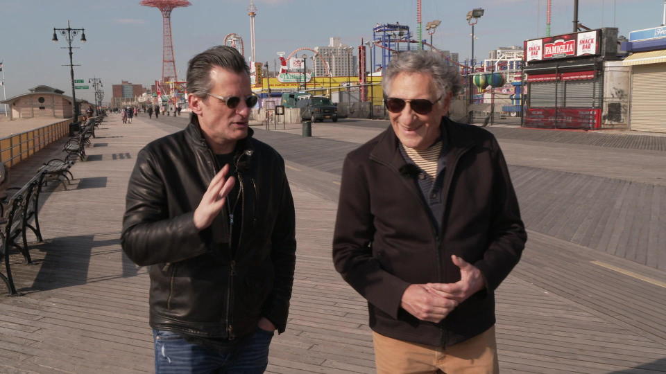 Oscar-nominated actor Jud Hirsch, right, with Turner Classic Movies host Ben Mankiewicz, on the Coney Island Boardwalk.  / Credit: CBS News