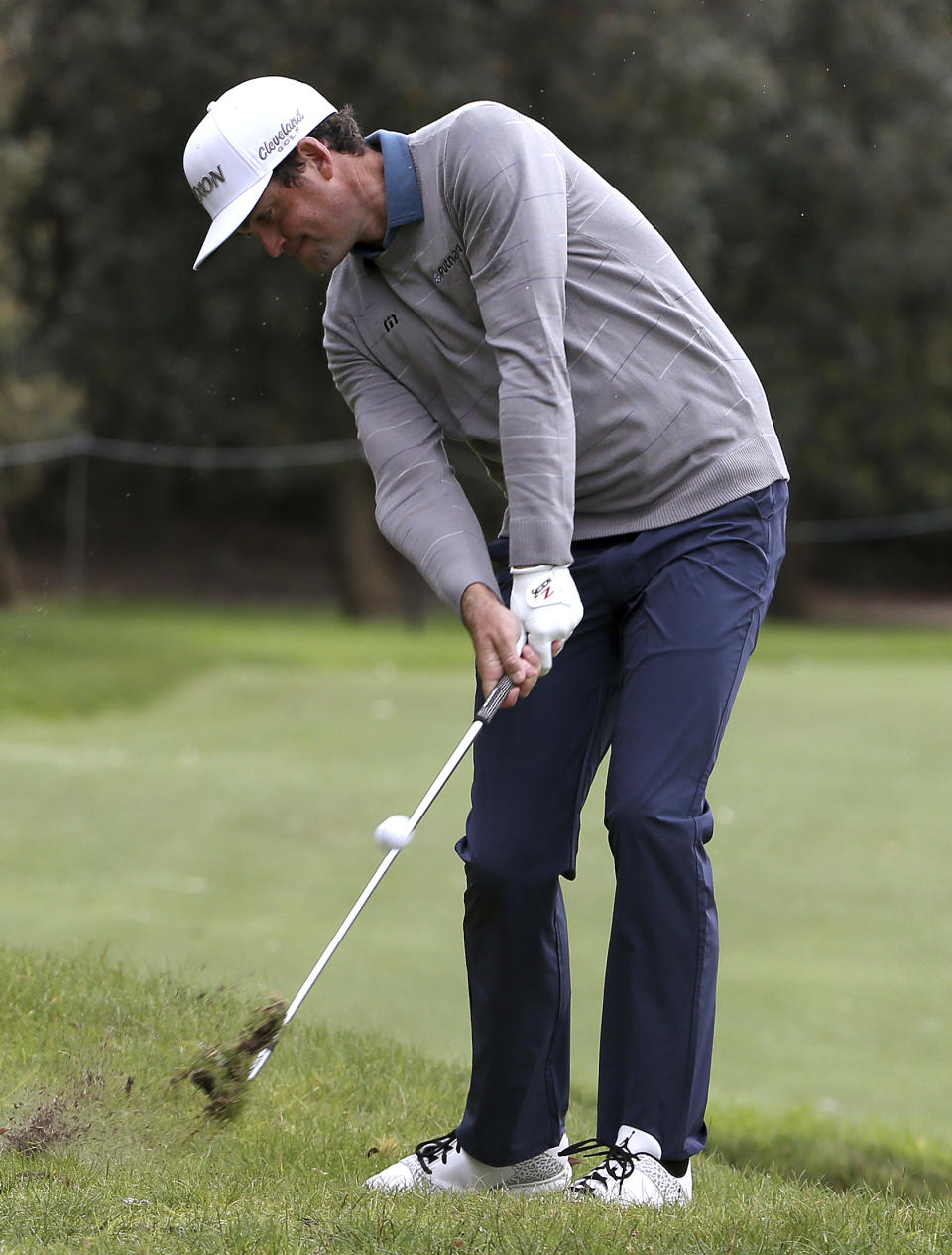 Keegan Bradley of the U.S.A. plays from the rough on the 4th during the Australian Open Golf tournament in Sydney, Thursday, Nov. 15, 2018. (AP Photo/Rick Rycroft)