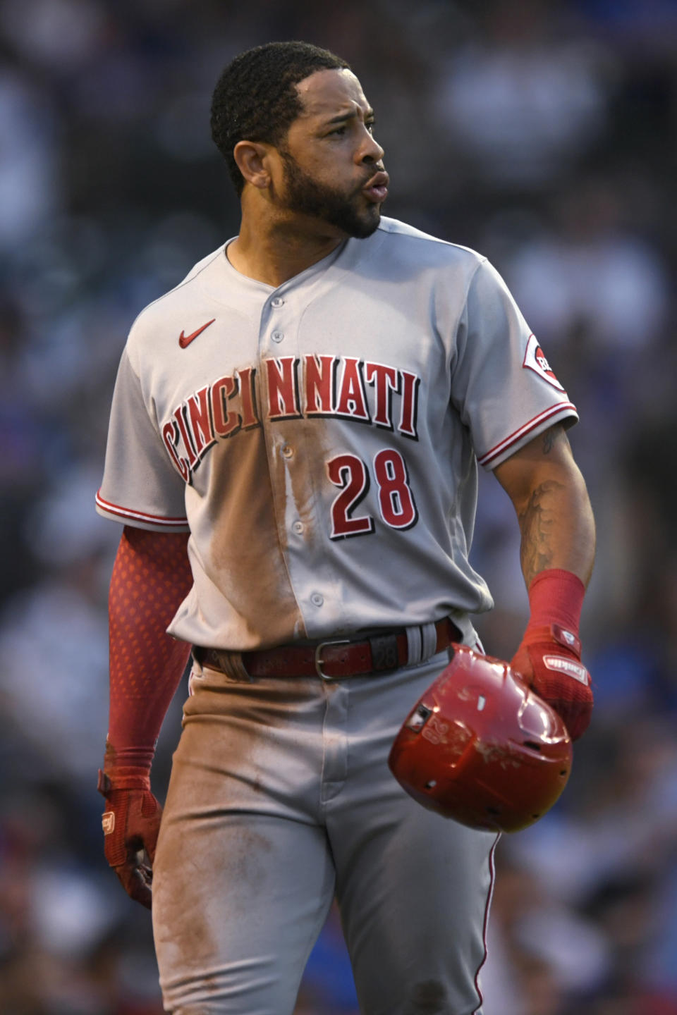 Cincinnati Reds' Tommy Pham walks to the dugout after being thrown out at home during the fourth inning of the team's baseball game against the Chicago Cubs on Wednesday, June 29, 2022, in Chicago. (AP Photo/Paul Beaty)