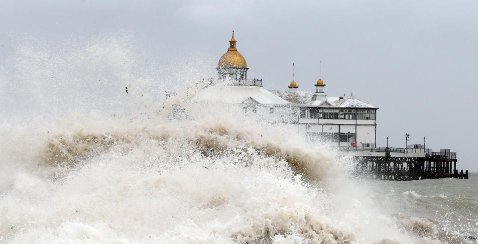 Waves crash near the pier in Eastbourne, East Sussex, as winds of up to 70mph are expected along the coast during the next 36 hours along with up to 90mm of rain as Storm Francis hit the UK.