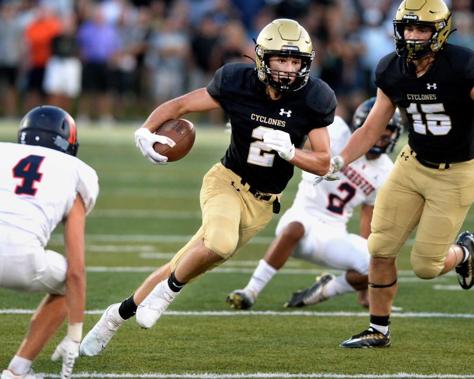 Sacred Heart-Griffin's Colin Johannes runs the ball against Rochester High School during the game at SHG Friday August 26, 2022.