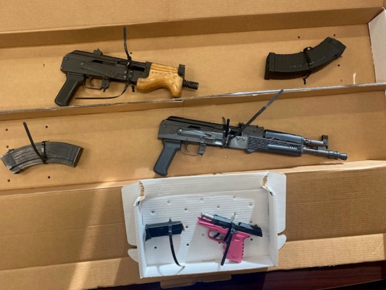 A 14-year-old Akron boy was charged in connection to the robbery of a cell phone at gunpoint Thursday, Feb. 2, 2023, in Akron's Kenmore neighborhood. Multiple guns, shown here, were found in his residence.