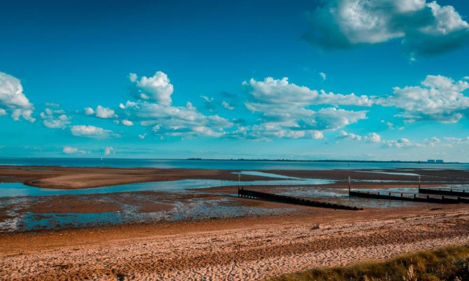 East Mersea beach at low tide, Mersea Island, Essex, England, UK.