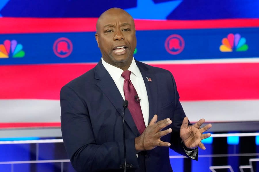 FILE – Sen. Tim Scott, R-S.C., speaks during a Republican presidential primary debate, Nov. 8, 2023, in Miami. Former President Donald Trump has narrowed his vice presidential shortlist to a handful of contenders that include Scott, as he prepares to announce his pick in the days before, or perhaps at, next month’s Republican National Convention. Trump told reporters Saturday, June 22, that he already has made his decision and that that person will be in attendance Thursday night in Atlanta at the first debate of the general election campaign with Democratic President Joe Biden. (AP Photo/Rebecca Blackwell, File)