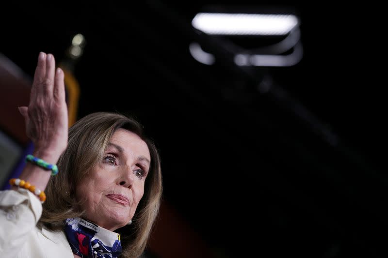 FILE PHOTO: Speaker of the House Pelosi delivers remarks during a weekly news conference on Capitol Hill in Washington