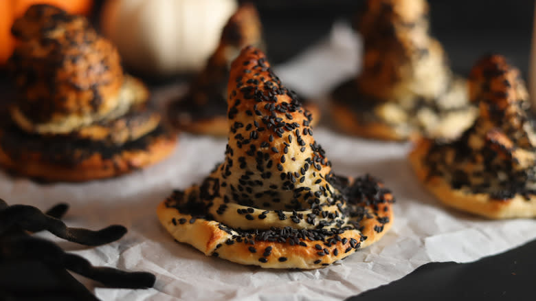 witch hat pastries on parchment paper
