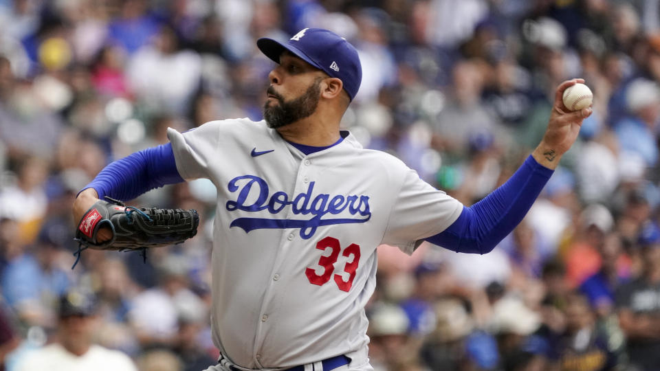 Los Angeles Dodgers' David Price throws during the sixth inning of a baseball game against the Milwaukee Brewers Thursday, Aug. 18, 2022, in Milwaukee. (AP Photo/Morry Gash)