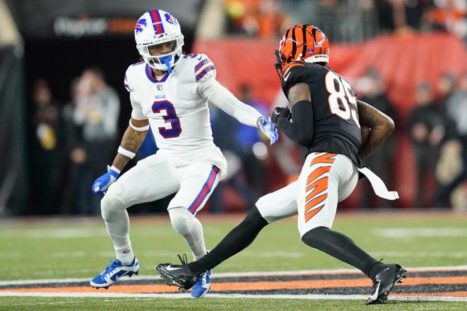 Cincinnati Bengals wide receiver Tee Higgins (85) runs near Buffalo Bills safety Damar Hamlin during the first half (AP)