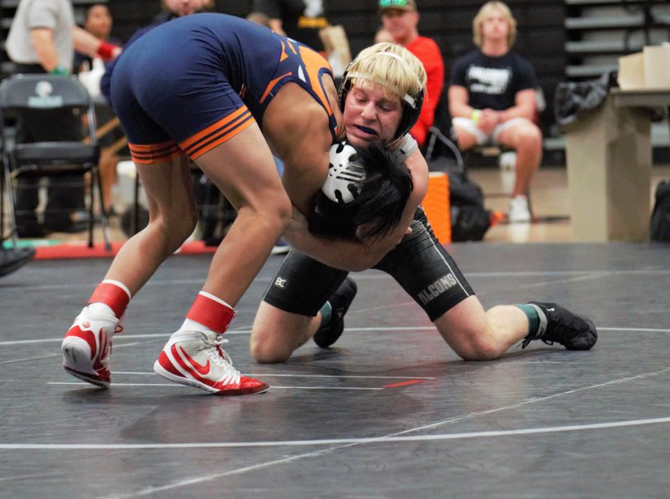 Jensen Beach junior Ryan Mooney battles Ethan Tran of Mater Lakes in the championship match at 120 pounds during Saturday's Region 4-1A Championship on Feb. 26, 2022 at Jensen Beach High School in Stuart. Mooney won via majority decision 17-4 to improve to 45-9 on the season.