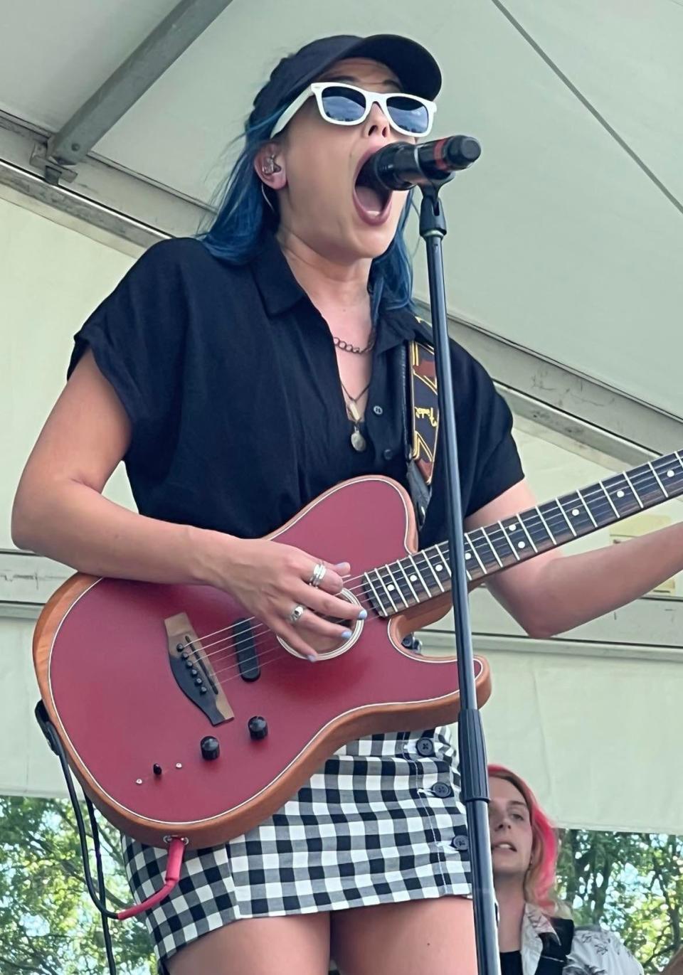 Jackie Popovec of The Vindys performs at The Firestone Country Club in Akron. Following last summer's release of the album, "Bugs," the Youngstown-based band has been performing both inside and outside the Akron-Canton area.