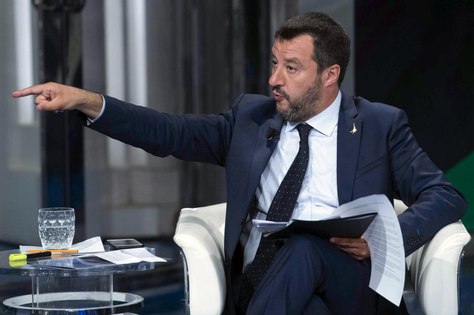 In this photo taken on Wednesday, May 22, 2019, Italian Deputy Premier and Interior Minister, Matteo Salvini, gestures as he takes part in a RAI State TV show in Rome. Dutch and British voters were the first to have their say Thursday in elections for the European Parliament, starting four days of voting across the 28-nation bloc that pits supporters of deeper integration against populist euroskeptics who want more power for their national governments. (Maurizio Brambatti/ANSA via AP)