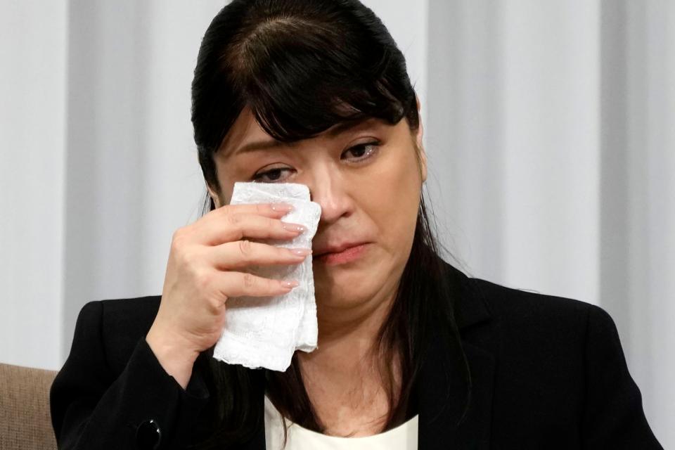 Julie Keiko Fujishima, president of entertainment company Johnny & Associates Inc. wipes her face during a press conference on Sept. 7, 2023.