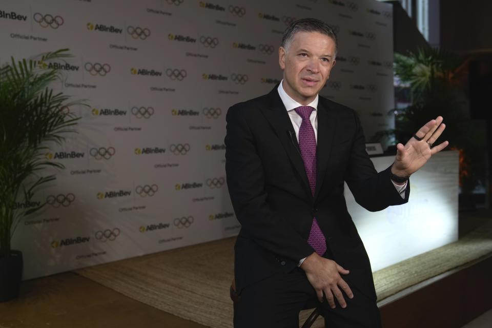 Anheuser-Busch InBev CEO Michel Doukeris speaks during an interview in London, Friday, Jan. 12, 2024. The International Olympic Committee has signed Anheuser-Busch InBev as the first beer brand in the 40-year history of its sponsorship program, which earns billions of dollars for the organization and international sports. (AP Photo/Kin Cheung)