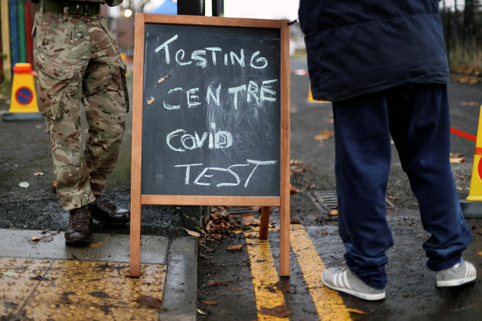 A blackboard is pictured at the entrance of a coronavirus disease (COVID-19) testing centre in Liverpool, Britain November 11, 2020. REUTERS/Carl Recine