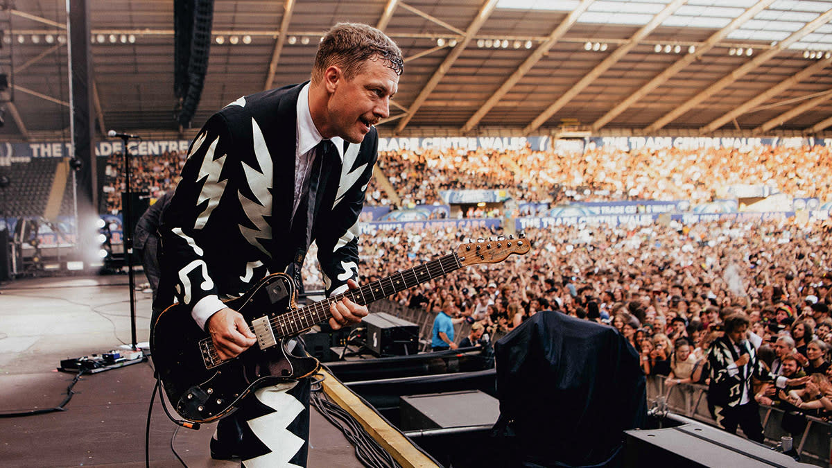  Nicholaus Arson performs onstage with the Hives. 