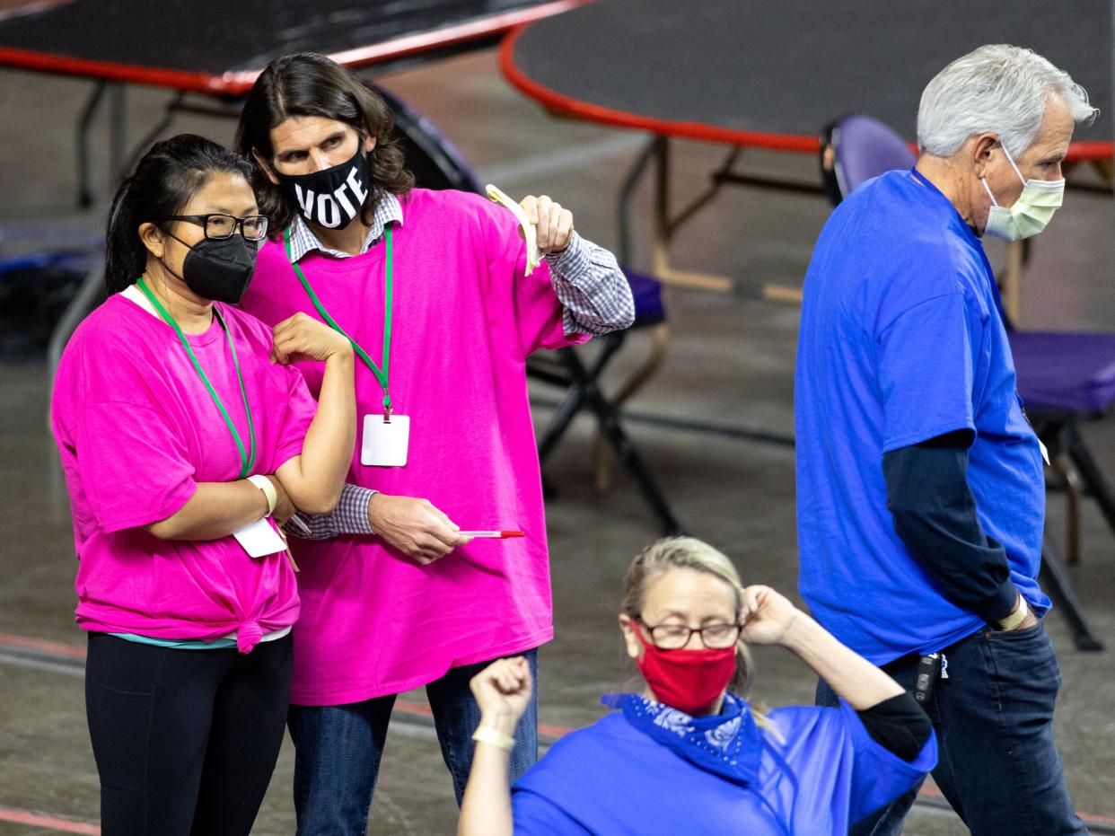 Ballots from the 2020 general election are being examined and recounted at Veterans Memorial Coliseum on May 1, 2021 in Phoenix, Arizona.  (Getty Images)