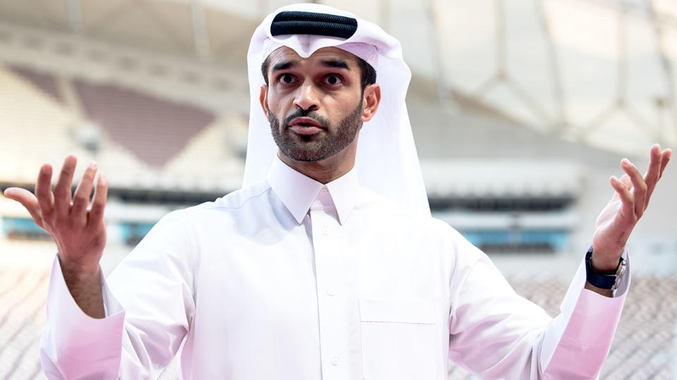 Seen here, Qatar 2022 organising committee chief Hassan Al-Thawadi speaks with reporters.