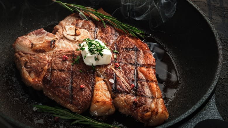 steak searing in a pan
