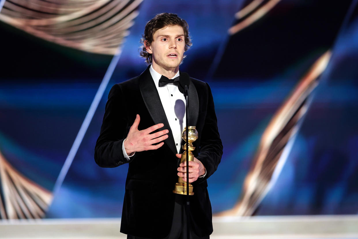 Evan Peters accepts the Golden Globe for best actor in a limited or anthology series or television film for 