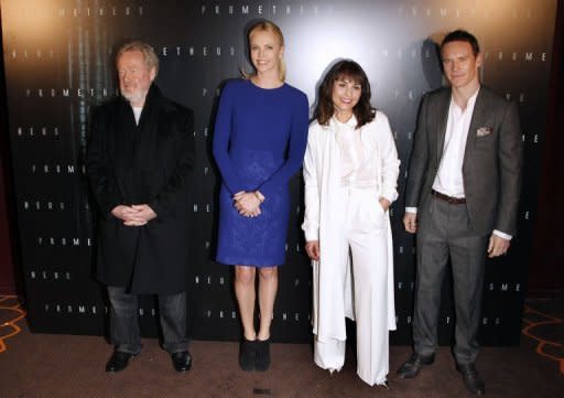 L-R: British film director Sir Ridley Scott, flanked by South African actress Charlize Theron, Swedish actress Noomi Rapace and Irish-German actor Michael Fassbender, poses during a photocall for the premiere of his movie "Prometheus" in Paris. Scott's new project follows a space mission in search of an alien civilisation believed to hold the key to the origins of mankind