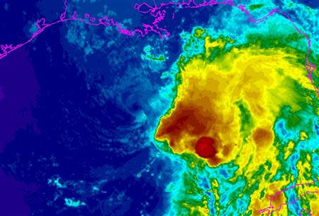 Tropical Storm Karen is seen in a National Oceanic and Atmospheric Administration (NOAA) Geostationary Operational Environmental Satellite (GOES) East infrared enhanced satellite image taken at 21:45 EST (00:45 GMT) October 4, 2013, and provided by NOAA. Authorities issued mandatory evacuation orders for low-lying areas south of New Orleans on Friday as the weakened Tropical Storm Karen closed in on the Louisiana coast after disrupting U.S. energy output in the Gulf of Mexico. REUTERS/NOAA/Handout via Reuters (UNITED STATES - Tags: ENVIRONMENT) ATTENTION EDITORS – THIS IMAGE WAS PROVIDED BY A THIRD PARTY. FOR EDITORIAL USE ONLY. NOT FOR SALE FOR MARKETING OR ADVERTISING CAMPAIGNS. THIS PICTURE WAS PROCESSED BY REUTERS TO ENHANCE QUALITY. AN UNPROCESSED VERSION WILL BE PROVIDED SEPARATELY