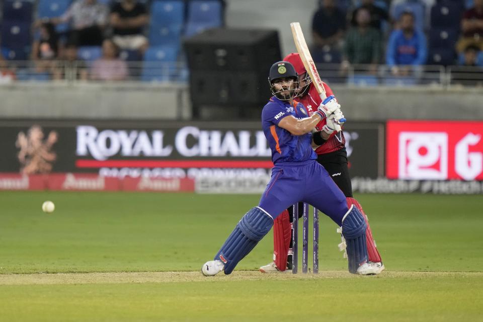 India's Virat Kohli plays a shot during the T20 cricket match of Asia Cup between India and Hong Kong, in Dubai, United Arab Emirates, Wednesday, Aug. 31, 2022. (AP Photo/Anjum Naveed)