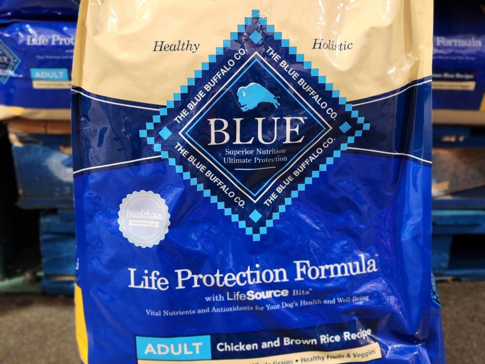 Bag of Blue Buffalo pet food on the floor