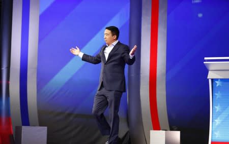 Entrepreneur Andrew Yang takes the stage for the start of the 2020 Democratic U.S. presidential debate in Houston, Texas, U.S.