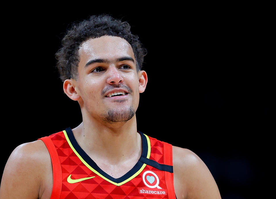 ATLANTA, GEORGIA - JANUARY 26:  Trae Young #11 of the Atlanta Hawks reacts after drawing a foul in the second half against the Washington Wizards at State Farm Arena on January 26, 2020 in Atlanta, Georgia.  NOTE TO USER: User expressly acknowledges and agrees that, by downloading and/or using this photograph, user is consenting to the terms and conditions of the Getty Images License Agreement.  (Photo by Kevin C. Cox/Getty Images)