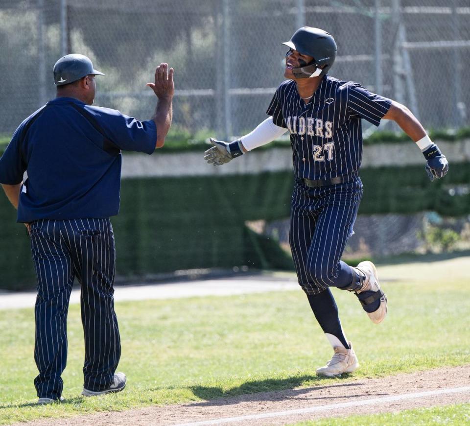 Central Catholic’s Joel Roberts hit a two-run home run in the first inning during the Northern California Regional Division III championship game with Oakmont at Central Catholic High School in Modesto, Calif., Saturday, June 3, 2023. Central Catholic won the game 5-2.
