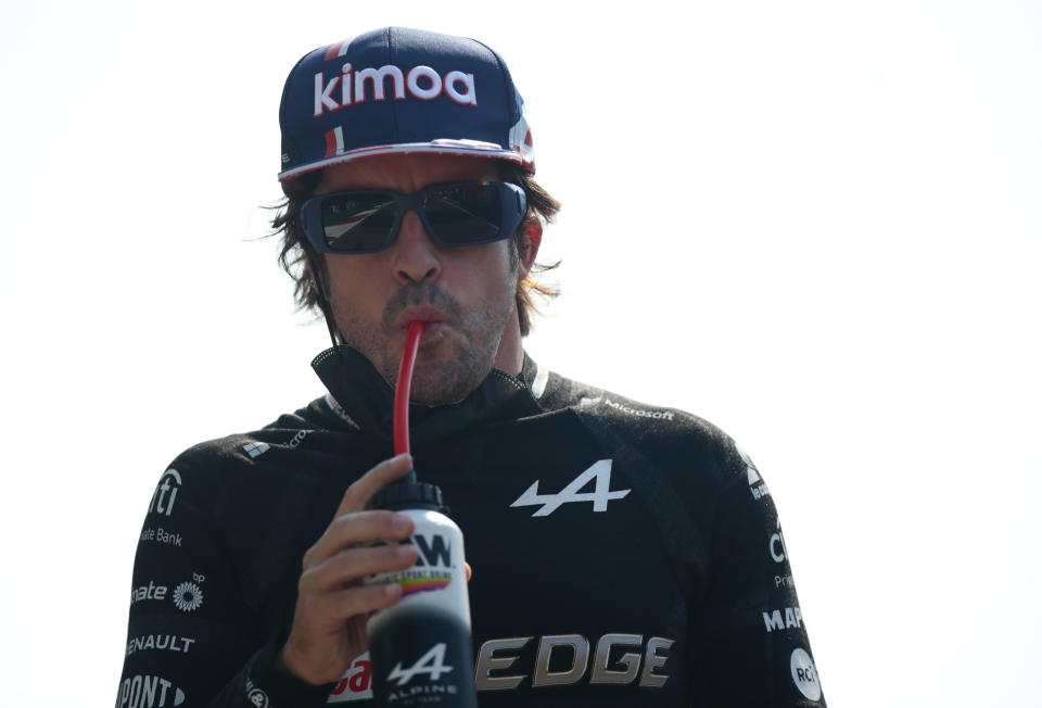 MONZA, ITALY - SEPTEMBER 12: Fernando Alonso of Spain and Alpine F1 Team walks to the grid before the F1 Grand Prix of Italy at Autodromo di Monza on September 12, 2021 in Monza, Italy. (Photo by Peter Fox/Getty Images)