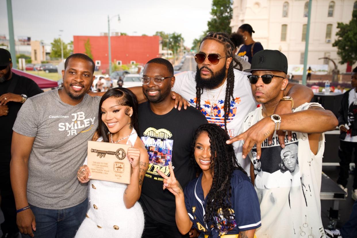 GloRilla poses after being given the key to the City of Memphis by Mayor Paul Young on Sunday during 901 Day festivities on Beale.